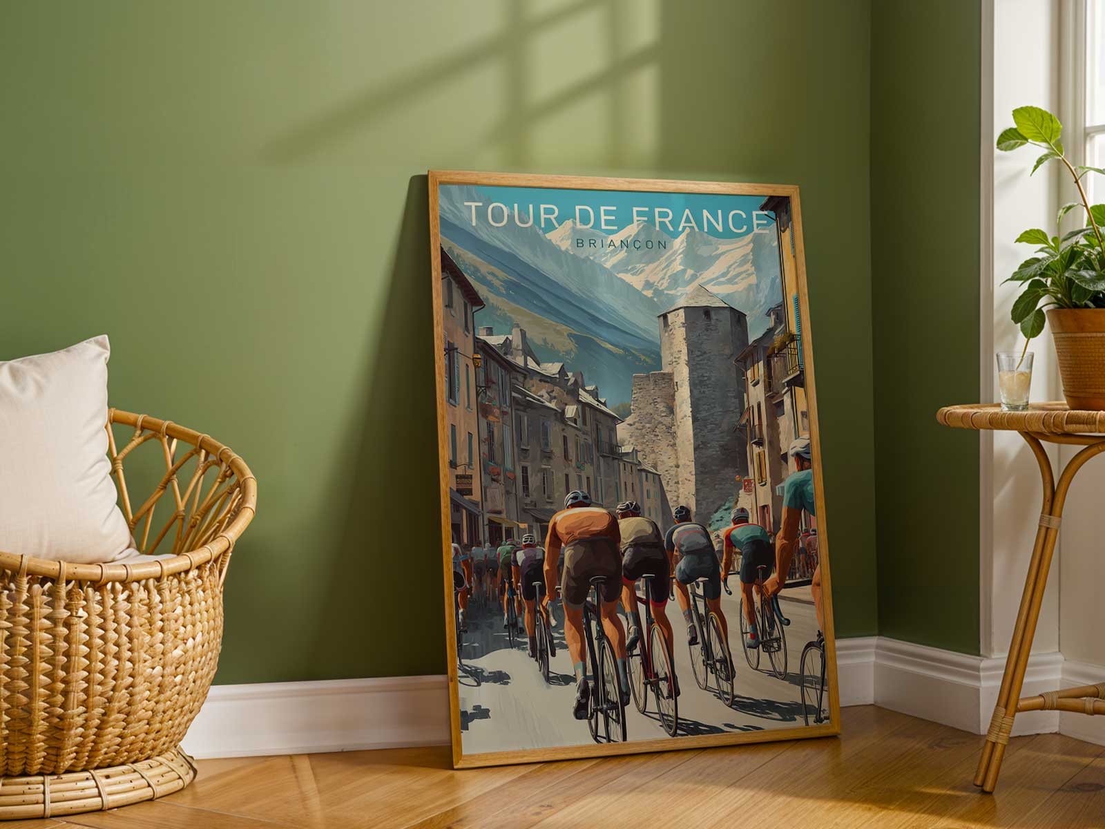 Historic peloton riding past stone buildings in Briançon during a vintage Tour de France stage