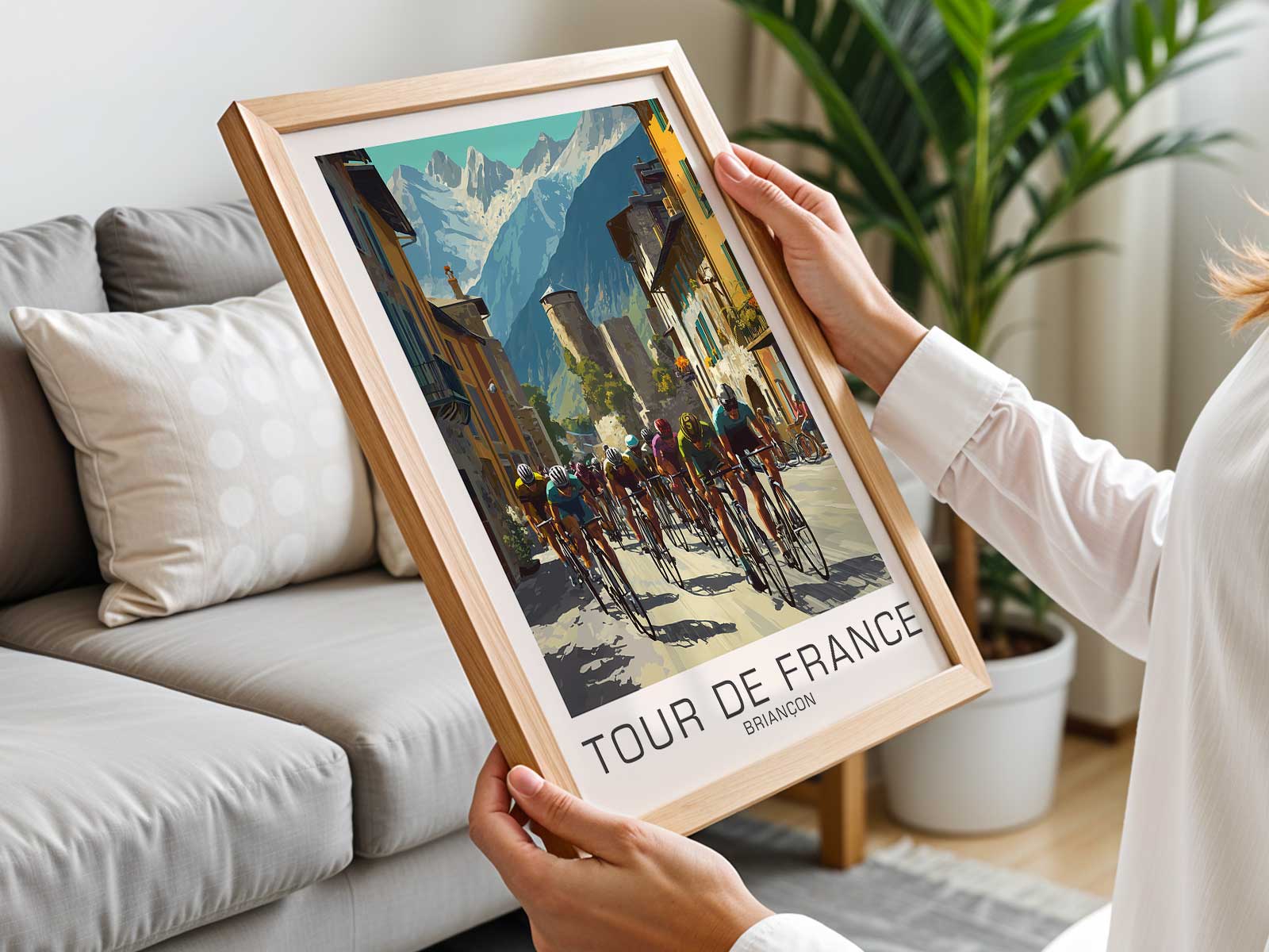 Framed Briançon Tour de France poster displayed on a wall to show decorative impact in an interior setting