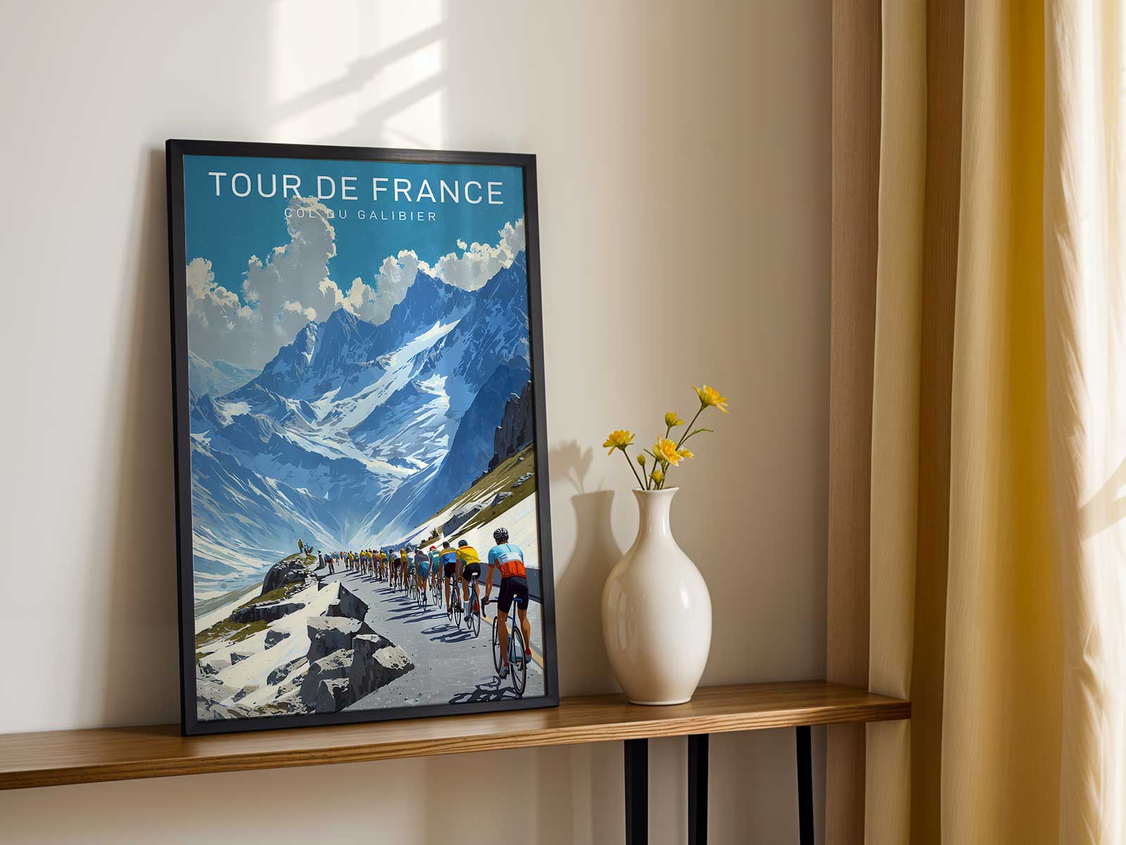 Retro poster style silhouette of a cyclist cresting the Col du Galibier summit with mountain ridges and a pale sky