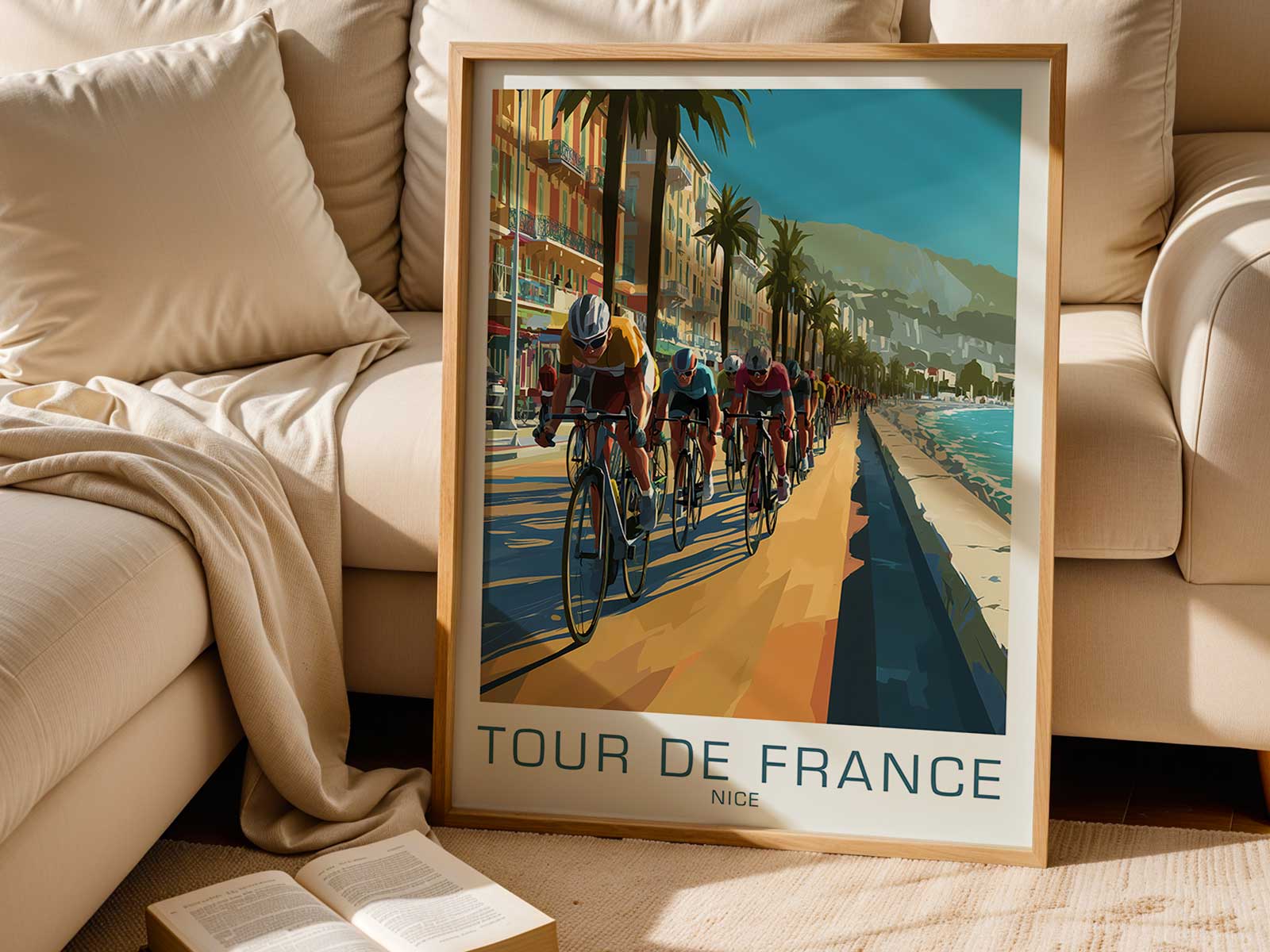Bike poster of a sunlit promontory hairpin turn near Nice with cheering spectators and coastal panorama