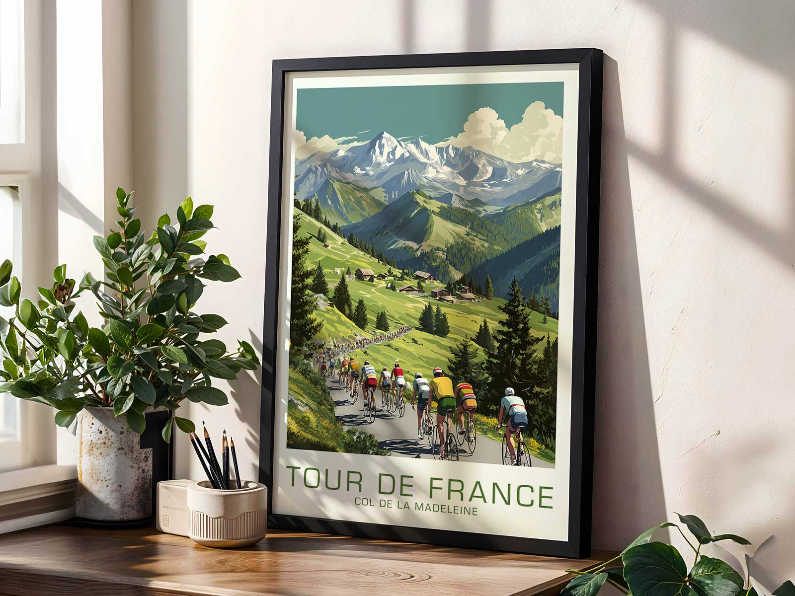 Panoramic poster of Col de la Madeleine with layered mountain ranges and the ascending road cutting through