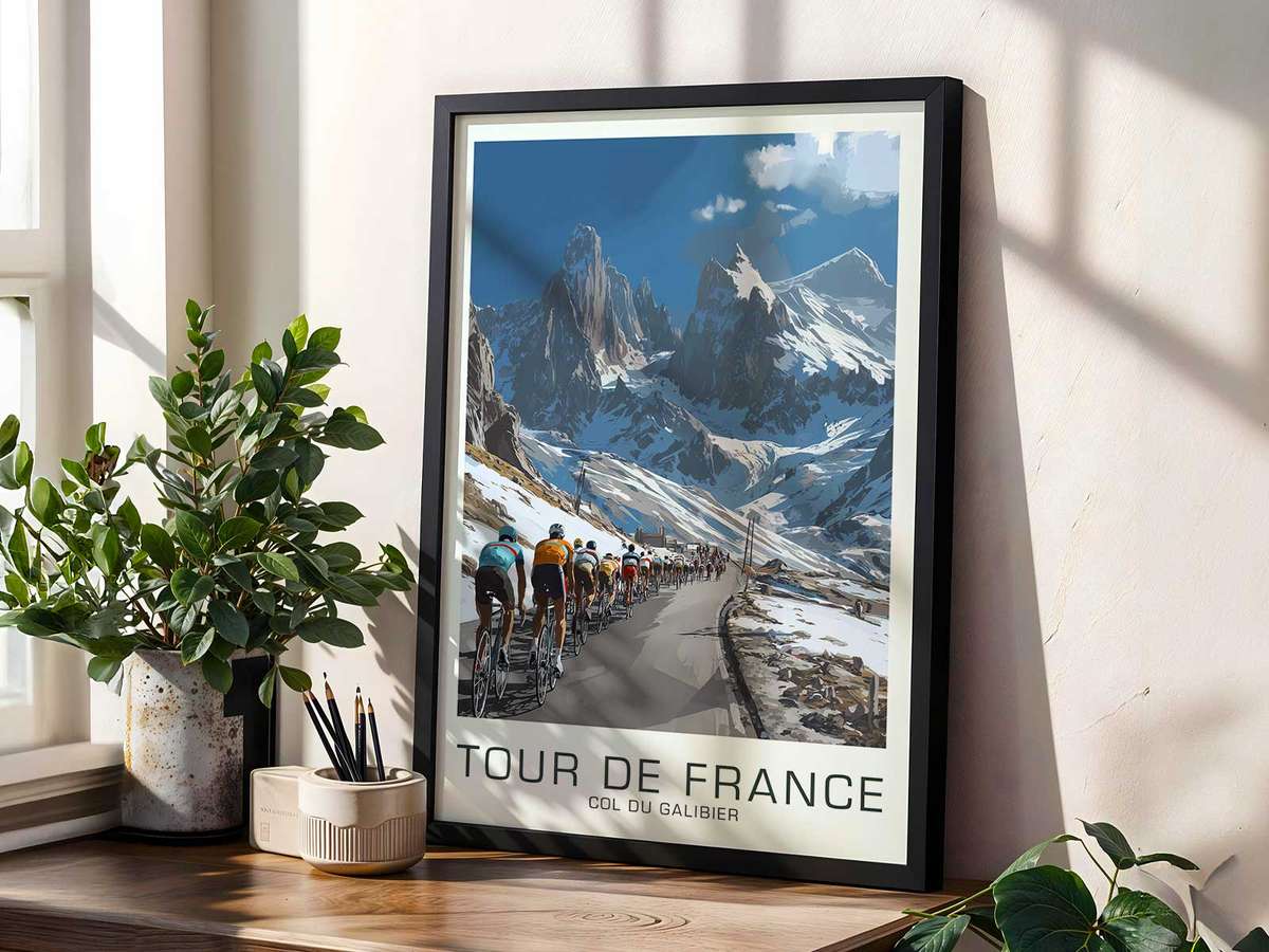 Long view of the winding Galibier road with a solitary cyclist small in the frame, emphasizing scale and resolve