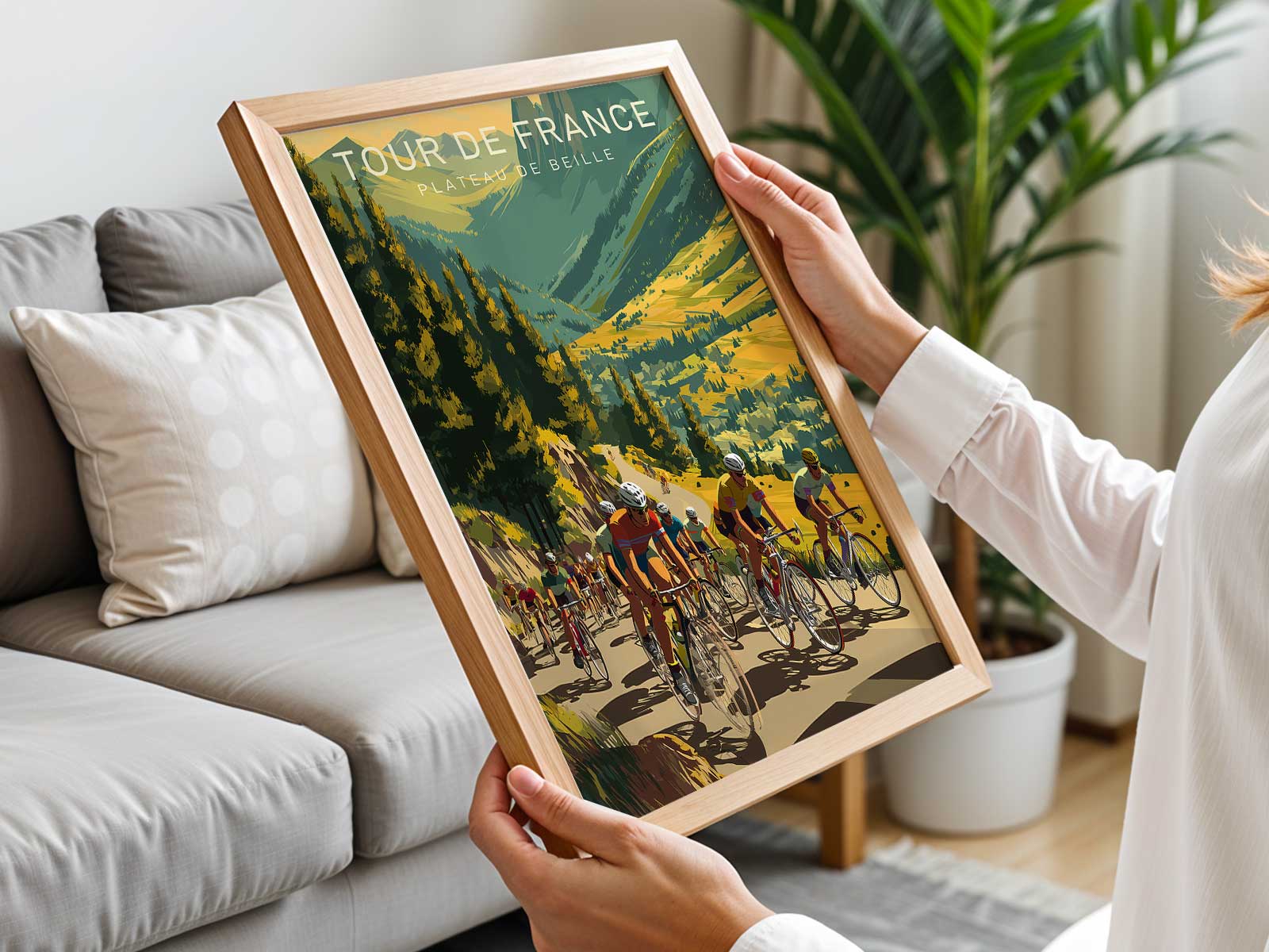 Poster of a cyclist silhouetted against a sunset gradient while climbing Plateau de Beille, warm tones and depth