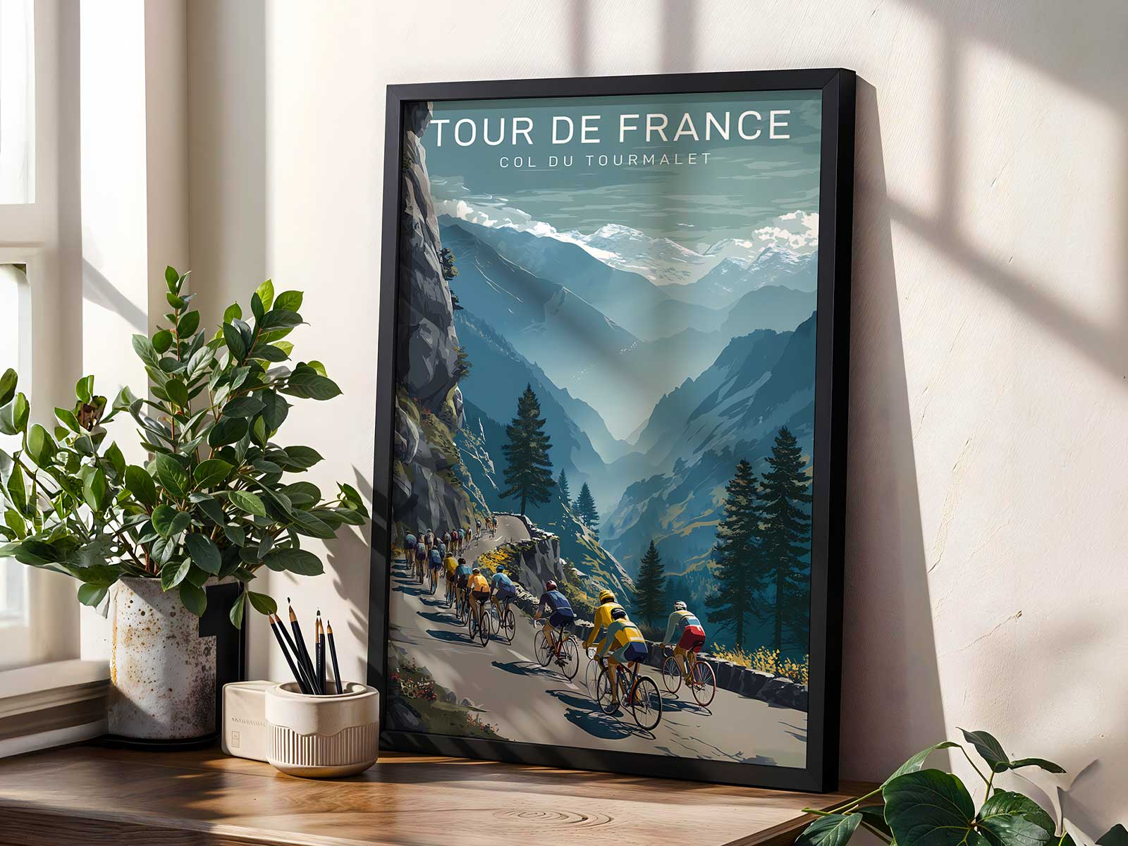 Vintage-style poster of a winding mountain road climbing toward the Col du Tourmalet with tiny cyclists in the distance…