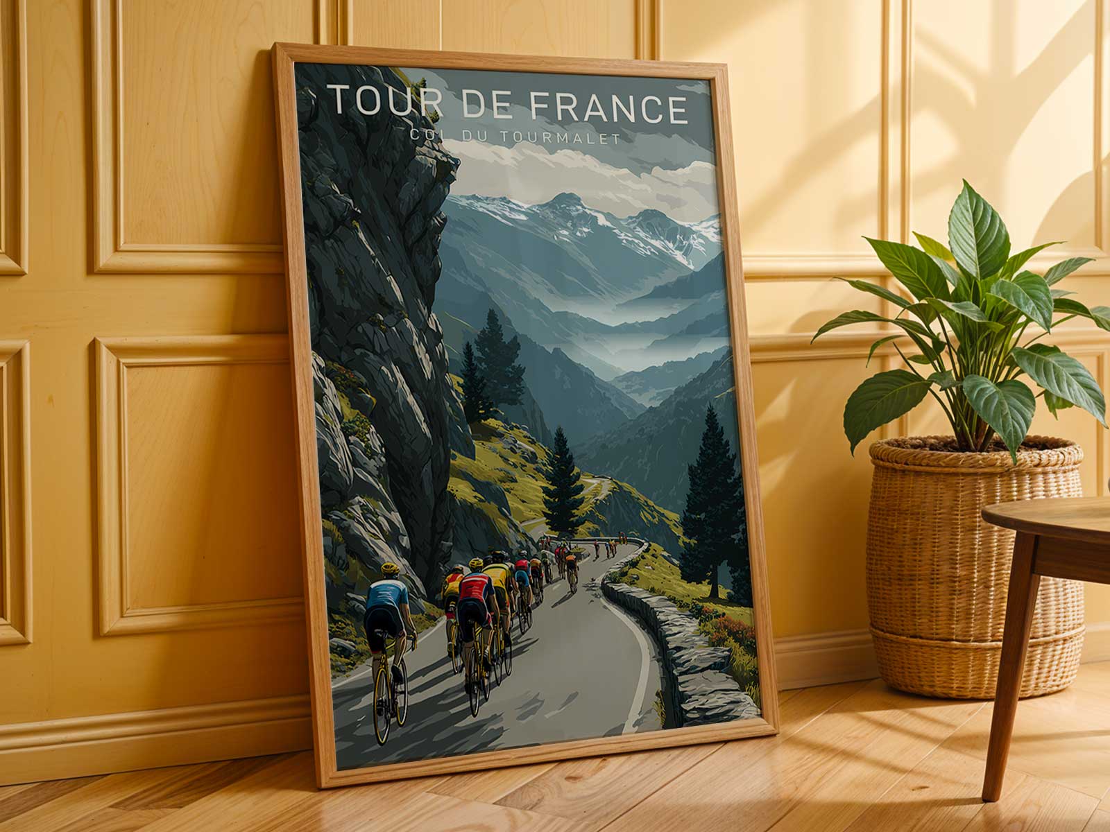 The winding road of the Tourmalet with a line of cyclists disappearing into the mountain curves